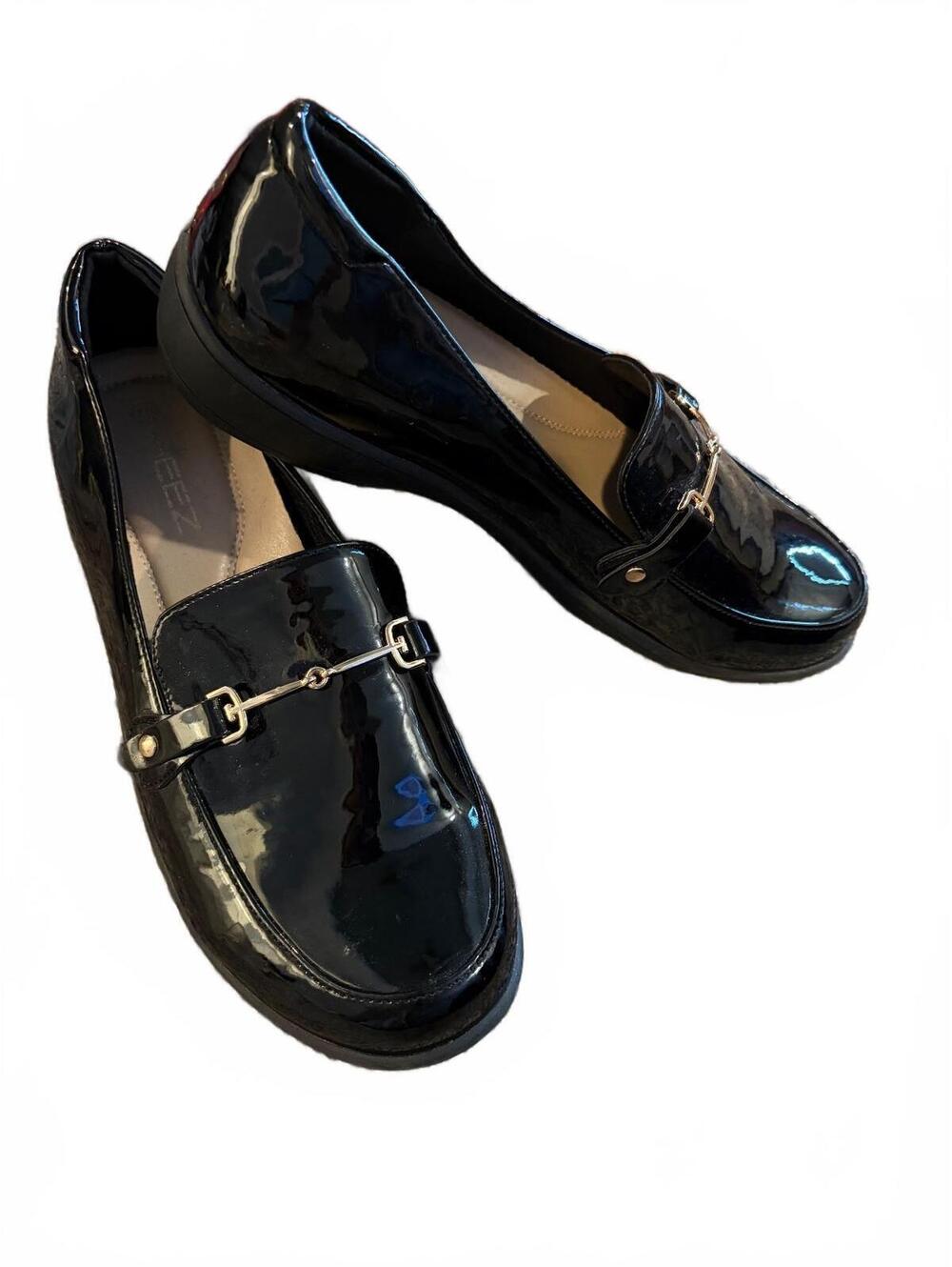 Women's black patent loafers with horsebit detail